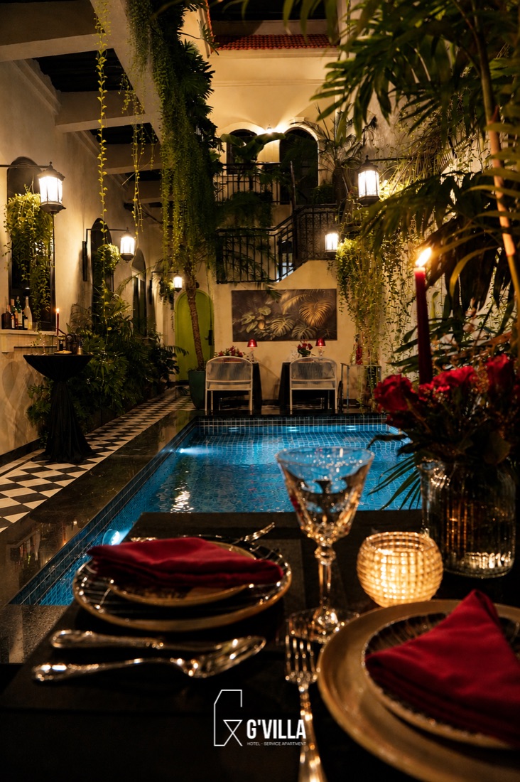 Candlelit private dining by the pool at G'Villa